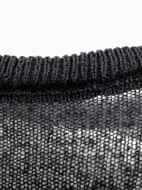 Top de manga larga de punto hueco