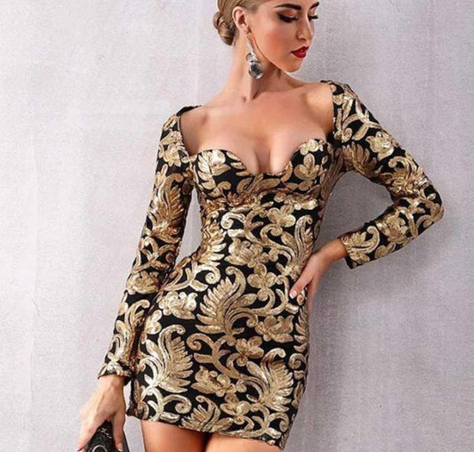 Vestido con escote en V profundo y lentejuelas